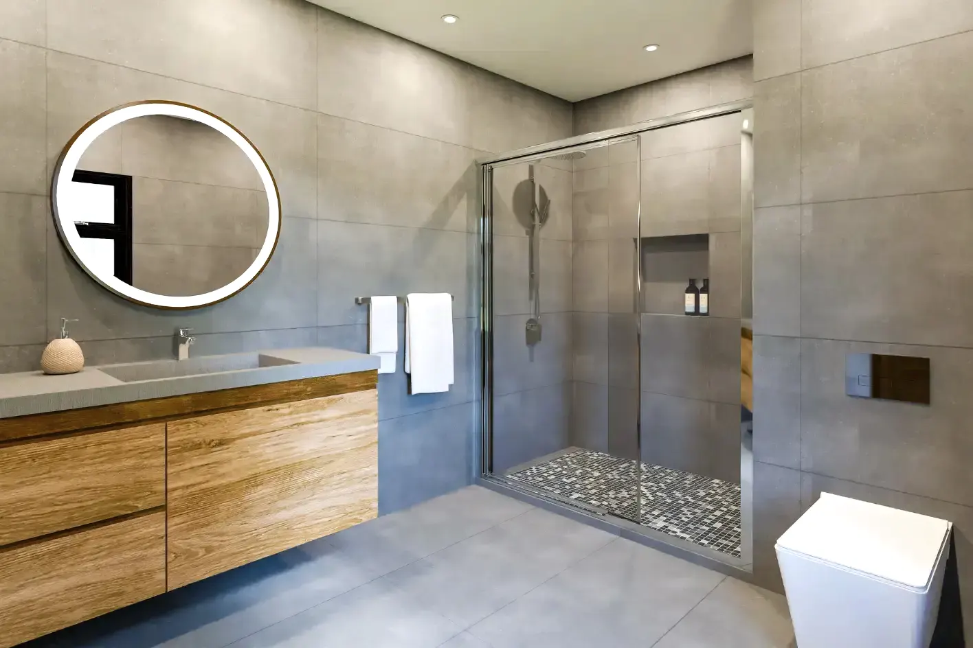 Ahşap banyo dolabı, yuvarlak LED ayna ve gri banyo dekorasyonu.